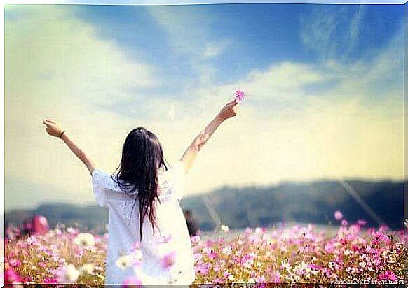 Woman on flower meadow