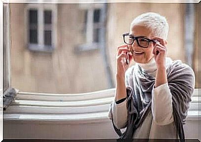 Elderly woman talking on the phone