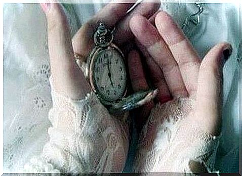 Clock in hands