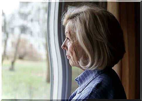 Woman looking out the window.