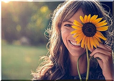 Woman with sunflower