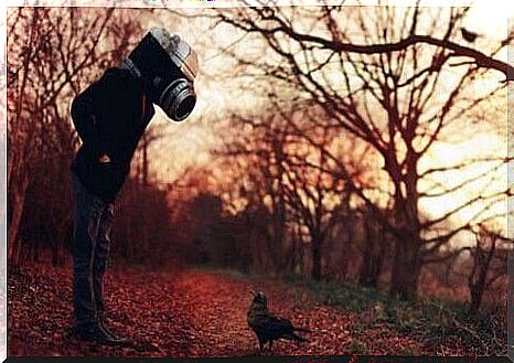 Man with a camera as his head